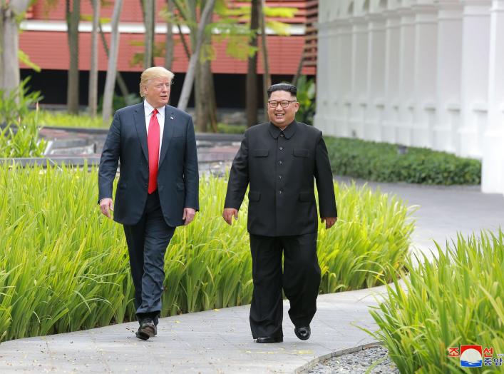 U.S. President Donald Trump walks with North Korean leader Kim Jong Un at the Capella Hotel on Sentosa island in Singapore in this picture released on June 12, 2018 by North Korea's Korean Central News Agency. KCNA via REUTERS ATTENTION EDITORS - THIS PIC