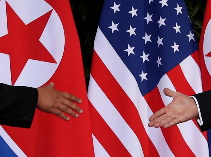 U.S. President Donald Trump and North Korea's leader Kim Jong Un meet at the start of their summit at the Capella Hotel on the resort island of Sentosa, Singapore June 12, 2018. Picture taken June 12, 2018. REUTERS/Jonathan Ernst