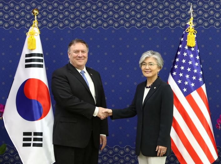 U.S. Secretary of State Mike Pompeo shakes hands with South Korean Foreign Minister Kang Kyung-wha during their meeting at the Foreign Ministry in Seoul, South Korea June 14, 2018. Chung Sung-Jun/Pool via REUTERS *** Local Caption *** Mike Pompeo; Kang Ky