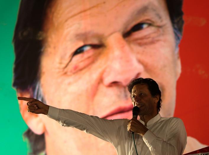 Imran Khan, chairman of the Pakistan Tehreek-e-Insaf (PTI) gestures while addressing his supporters during a campaign meeting ahead of general elections in Islamabad, Pakistan, July 21, 2018. REUTERS/Athit Perawongmetha