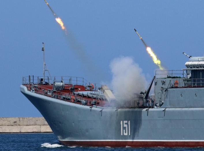 A Russian warship fires missiles during the Navy Day parade in the Black Sea port of Sevastopol, Crimea, July 29, 2018. REUTERS/Pavel Rebrov