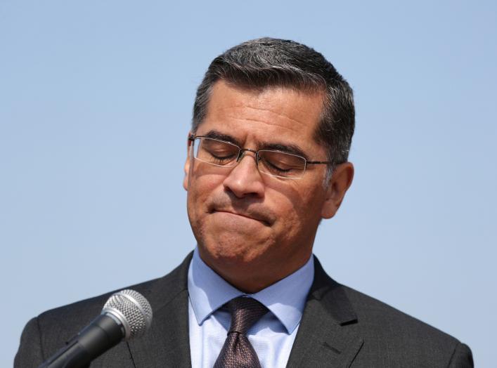 California Attorney General Xavier Becerra speaks about President Trump's proposal to weaken national greenhouse gas emission and fuel efficiency regulations, at a media conference in Los Angeles, California, U.S. August 2, 2018. REUTERS/Lucy Nicholson
