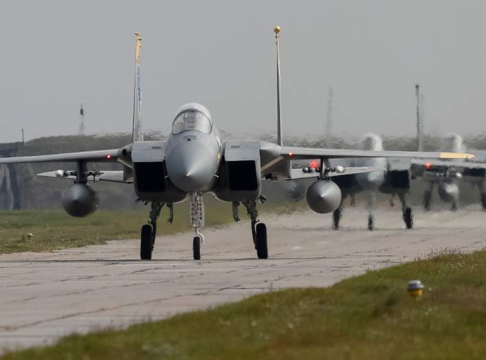 U.S. Air Force F-15 fighter jets are seen on the tarmac during the Clear Sky 2018 multinational military drills at Starokostiantyniv Air Base in Khmelnytskyi Region, Ukraine October 12, 2018. REUTERS/Gleb Garanich