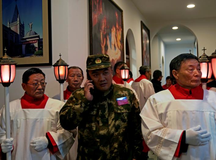 Chinese Catholics attend a mass in a church on Christmas Eve in Shanghai, China December 24, 2018. REUTERS/Aly Song