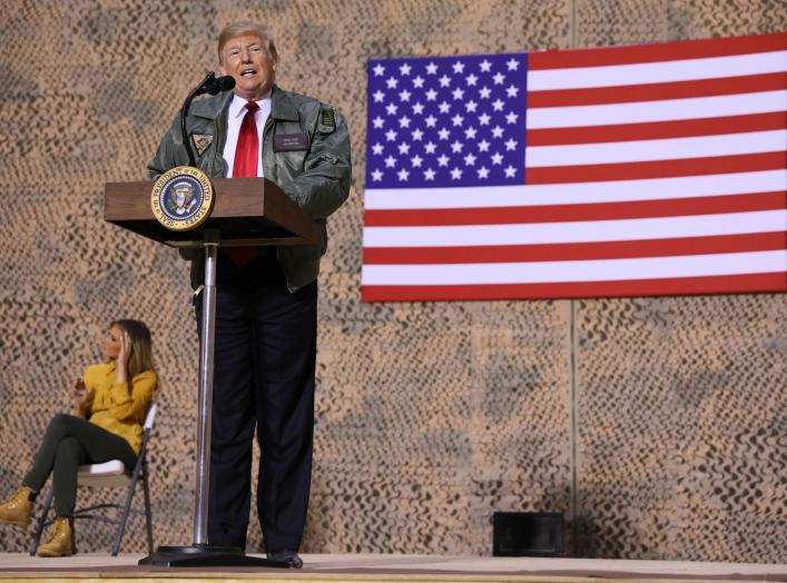 U.S. President Donald Trump delivers remarks to U.S. troops in an unannounced visit to Al Asad Air Base, Iraq December 26, 2018. REUTERS/Jonathan Ernst