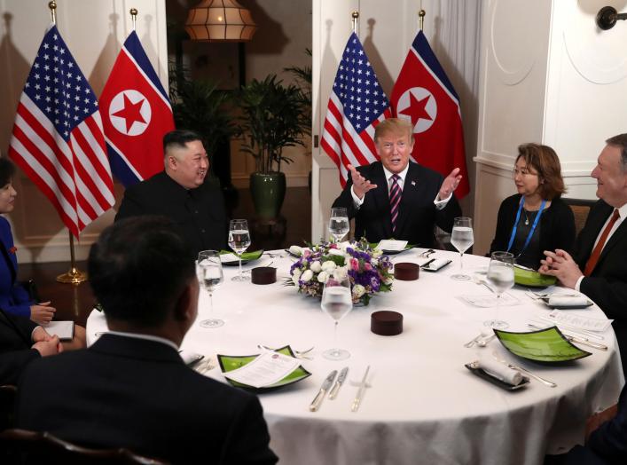 FILE PHOTO - U.S. President Donald Trump and North Korean leader Kim Jong Un sit down for a dinner during the second U.S.-North Korea summit at the Metropole Hotel in Hanoi, Vietnam February 27, 2019. Also pictured at right are U.S. Secretary of State Mik