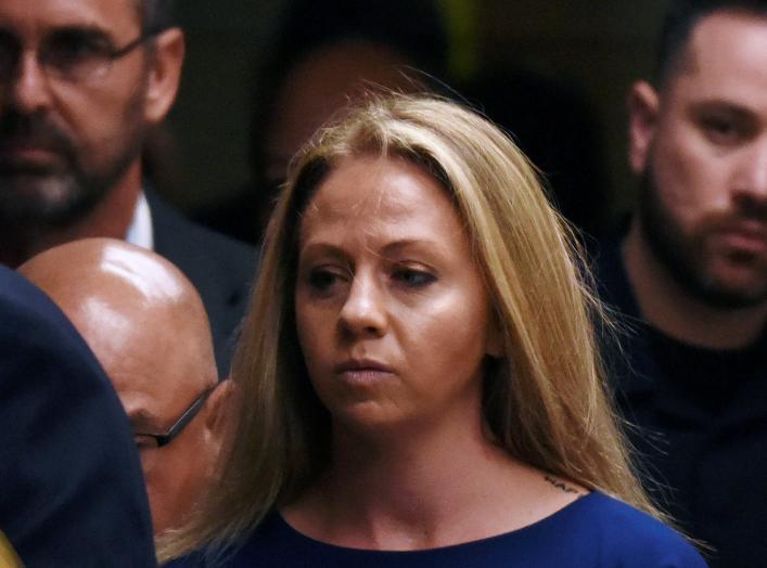 Amber Guyger, who is charged in the killing of Botham Jean in his own home, arrives on the first day of the trial in Dallas, Texas, U.S., September 23, 2019. REUTERS/Jeremy Lock