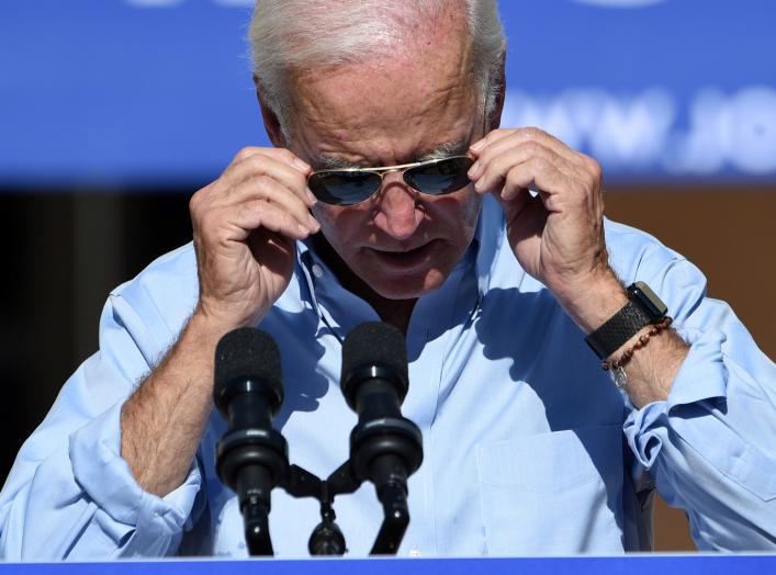 Democratic U.S. presidential candidate and former Vice President Joe Biden adjusts his glasses as he speaks at a community event in Las Vegas, Nevada, U.S., September 27, 2019. REUTERS/David Becker