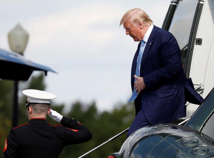 U.S. President Donald Trump walks out from Marine One helicopter as he arrives at Walter Reed National Military Medical Center in Bethesda, Maryland, U.S., October 4, 2019. REUTERS/Yuri Gripas