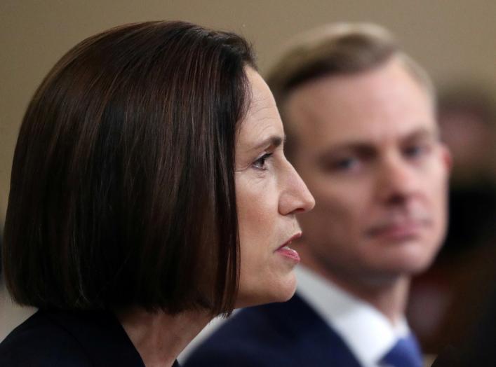 Fiona Hill, former senior director for Europe and Russia on the National Security Council, testifies before a House Intelligence Committee hearing alongside David Holmes, political counselor at the U.S Embassy in Kiev, as part of the impeachment inquiry