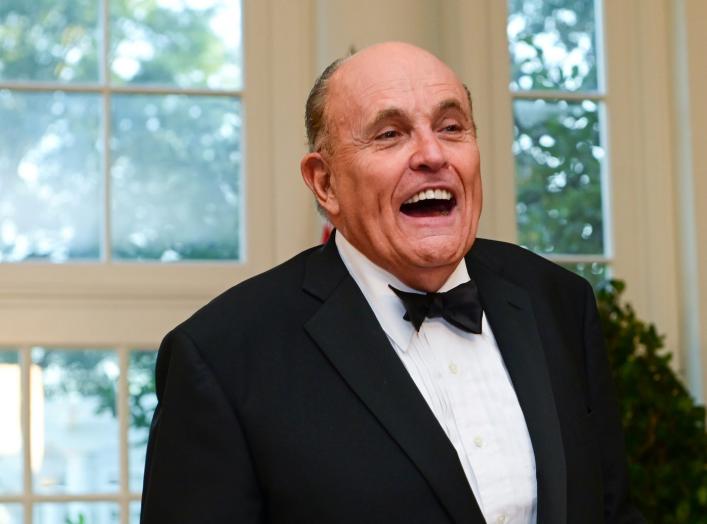 FILE PHOTO: Rudy Giuliani arrives for a State Dinner for Australia’s Prime Minister Scott Morrison at the White House in Washington, U.S. September 20, 2019. REUTERS/Erin Scott/File Photo