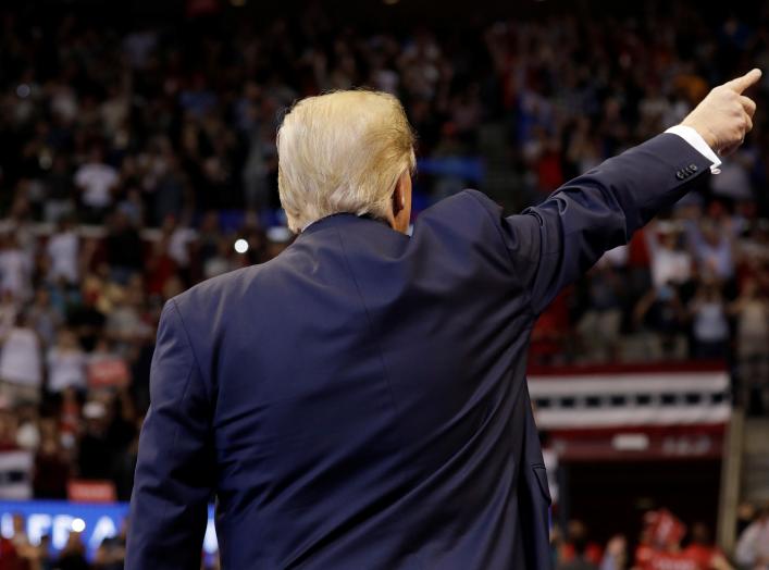 U.S. President Donald Trump gestures as he holds a campaign rally in Sunrise, Florida, U.S., November 26, 2019. REUTERS/Yuri Gripas