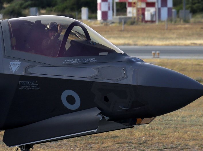 A pilot in a F-35B aircraft waves after landing at the Akrotiri Royal Air Forces base before landing, near city of Limassol