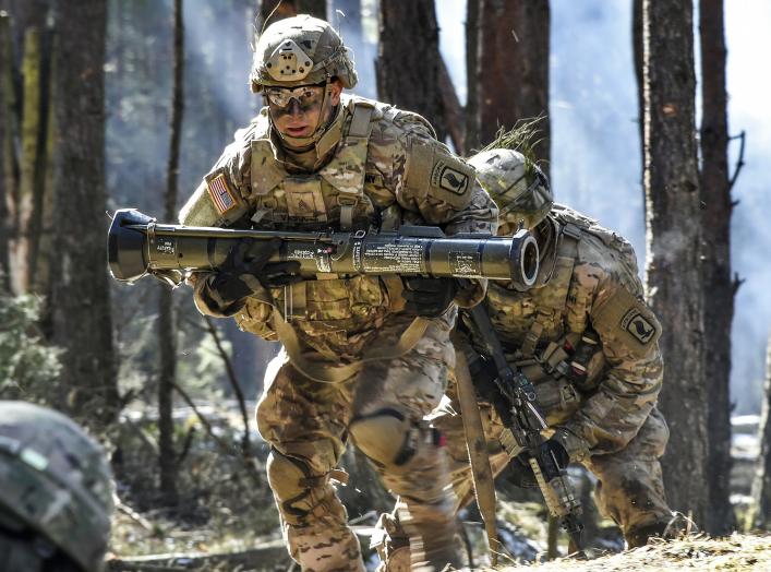 A U.S. Army Paratrooper with 2nd Battalion, 503rd Infantry Regiment, 173rd Airborne Brigade carries a AT-4 training grenade launcher    during a platoon level live fire exercise at the 7th Army Training Command’s Grafenwoehr Training Area, Germany, March 