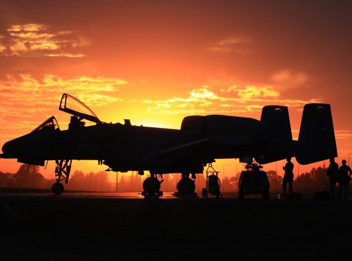 Airmen from the Maryland National Guard's 175th Wing load weapons on an A-10C at sunset. (Photo courtesy of the 175th Wing)