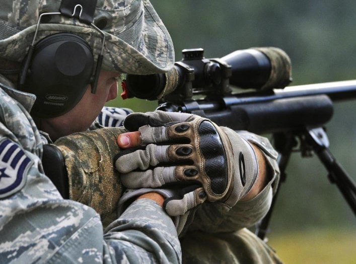 Air Force Staff Sgt. Ryan Link trains with the M24 Sniper Weapon System on Joint Base Elmendorf-Richardson, Alaska, July 11, 2014. U.S. Air Force photo by Justin Connaher