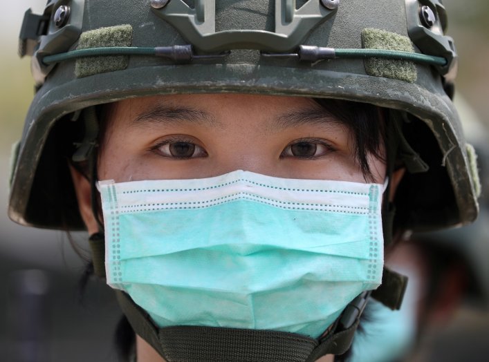 Soldiers with face masks to protect them from coronavirus disease (COVID-19) at a military base camp in Tainan, Taiwan, April 9, 2020. REUTERS/Ann Wang