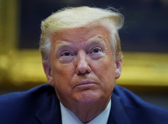 U.S. President Donald Trump participates in a "small business relief update" video conference call event with banking executives to discuss the U.S. government's rescue program for businesses hurt by the coronavirus pandemic, in the Roosevelt Room at the 