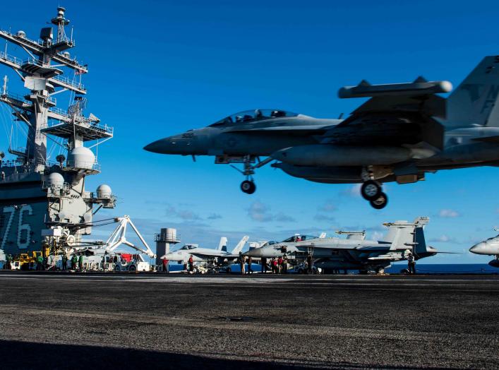 PHILIPPINE SEA (June 20, 2018) An EA-18G Growler assigned to Electronic Attack Squadron (VFA) 141 lands on the flight deck of the Navy's forward-deployed aircraft carrier, USS Ronald Reagan (CVN 76). Ronald Reagan, the flagship of Carrier Strike Group 5, 