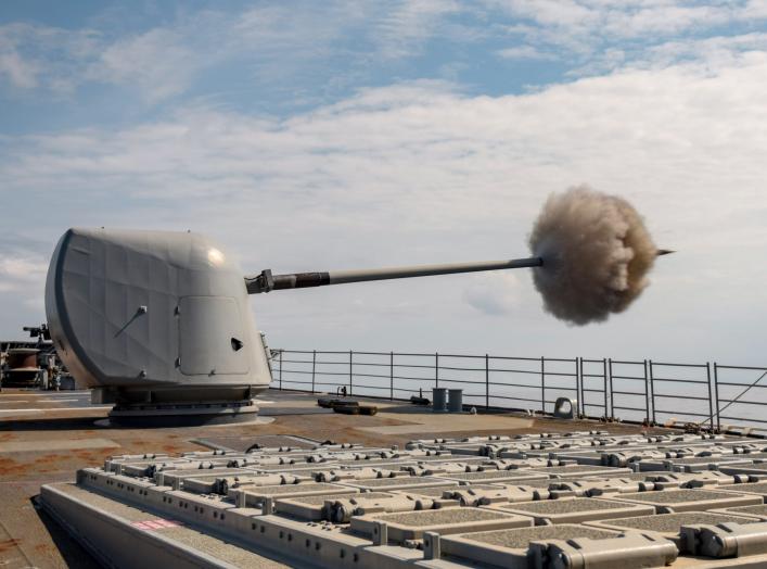 ADRIATIC SEA (June 6, 2018) The guided-missile cruiser USS Normandy (CG 60) fires its Mark 45 5-inch gun during a live-fire exercise. Normandy is deployed as part of the Harry S. Truman Carrier Strike Group