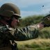 Sgt. Devin Hughes, a member of the Marine Corps Shooting Team, fires a round at a target during the Royal Marines Operational Shooting Competition at Altcar Range near Hightown, England, Sept. 8, 2014. (U.S. Marine Corps photo by Cpl. Cameron Storm/Releas