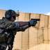 An Air Force pararescueman fires his Glock 9 mm handgun during weapons training at Bagram Airfield, Afghanistan, Feb. 21, 2018. Air Force photo by Tech. Sgt. Gregory Brook