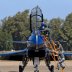 Pilots of China's J-10 fighter jet from the People's Liberation Army Air Force August 1st Aerobatics Team prepare before a media demonstration at the Korat Royal Thai Air Force Base, Nakhon Ratchasima province, Thailand, November 24, 2015. REUTERS/Athit P