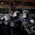 DC riot police form a line across K Street Northwest at 13th Street as protesters react to the swearing in of U.S. President Donald Trump in downtown Washington, U.S., January 20, 2017. REUTERS/James Lawler Duggan