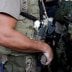 A militia member has an egg on his body armor during rally in Charlottesville, Virginia, U.S., August 12, 2017. REUTERS/Joshua Roberts