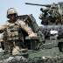 A US serviceman stands on M1126 Stryker Infantry Carrier Vehicle (ICV) during a closing ceremony of NATO-led joint military exercises Noble Partner 2017 at Vaziani Training Area outside Tbilisi, Georgia, August 12, 2017. REUTERS/David Mdzinarishvili