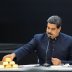 Venezuela's President Nicolas Maduro touches a gold bar as he speaks during a meeting with the ministers responsible for the economic sector at Miraflores Palace in Caracas, Venezuela March 22, 2018. REUTERS/Marco Bello