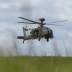 An Apache helicopter flies during a media availability to show the 3 Regiment Army Air Corps preparing for the forthcoming royal wedding between Prince Harry and Meghan Markle, at Wattisham Airfield, Britain May 10, 2018. Aaron Chown/Pool via Reuters