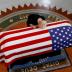 Cindy McCain, wife of U.S. Senator John McCain, touches the casket during a memorial service at the Arizona Capitol in Phoenix, Arizona, U.S., August 29, 2018. Ross D. Franklin/Pool via REUTERS