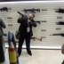 A man holds a gun during LAAD, the biggest military industry expo in Latin America in Rio de Janeiro, Brazil April 2, 2019. REUTERS/Ricardo Moraes