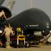 U.S. Air Force maintainers prepare a U.S. military drone RQ-4A Global Hawk for takeoff at an undisclosed location in Southwest Asia, December 2, 2010. Picture taken December 2, 2010. Courtesy Eric Harris/U.S. Air Force/Handout via REUTERS