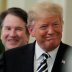 U.S. President Donald Trump smiles next to U.S. Supreme Court Associate Justice Brett Kavanaugh as they participate in a ceremonial public swearing-in in the East Room of the White House in Washington, U.S., October 8, 2018. REUTERS/Jim Bourg