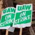 "UAW on strike" picket signs lay on a pile of wood outside the General Motors Detroit-Hamtramck Assembly in Hamtramck, Michigan, U.S. October 25, 2019. REUTERS/Rebecca Cook