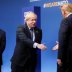 NATO Secretary General Jens Stoltenberg and Britain's Prime Minister Boris Johnson greet U.S. President Donald Trump at the annual NATO heads of government summit at the Grove hotel in Watford, Britain December 4, 2019. REUTERS/Peter Nicholls/Pool