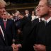 U.S. President Donald Trump greets Supreme Court Chief Justice John Roberts as he arrives to deliver his State of the Union address to a joint session of the U.S. Congress in the House Chamber of the U.S. Capitol in Washington, U.S. February 4, 2020. REUT