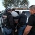 ICE Field Office Director, Enforcement and Removal Operations, David Marin and U.S. Immigration and Customs Enforcement's (ICE) Fugitive Operations team arrest a Mexican national at a home in Paramount, California, U.S., March 1, 2020. REUTERS/Lucy Nichol