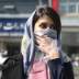 An Iranian woman wears a protective face mask, following the coronavirus outbreak, as she walks in Tehran, Iran March 5, 2020. WANA (West Asia News Agency)/Nazanin Tabatabaee via REUTERS