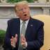 U.S. President Donald Trump answers questions from the news media during his meeting with Ireland's Prime Minister, Taoiseach Leo Varadkar, in the Oval Office of the White House in Washington, U.S., March 12, 2020. REUTERS/Leah Millis