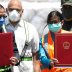 China's ambassador in Venezuela Li Baorong and Venezuela's Vice President Delcy Rodriguez are seen after the arrival of humanitarian aid coming from China at Simon Bolivar international airport during the national quarantine in response to the spread of t