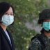 Taiwanese president Tsai Ing-Wen, wearing a mask, observe soldiers demonstrate drills at a military base camp in Tainan, Taiwan, April 9, 2020. REUTERS/Ann Wang