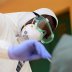 A medical worker takes a sample for COVID-19 during a community testing, as authorities race to contain the spread of coronavirus disease (COVID-19) in Abuja, Nigeria April 15, 2020. REUTERS/Afolabi Sotunde