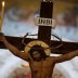 A crown of thorns is placed on a crucifix during the procession of Jesus Christ's Deposition from the Cross taking place in a church behind closed doors, as part of measures to contain the spread of the coronavirus disease (COVID-19) in Athens, Greece, Ap