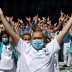 Healthcare workers, nurses and doctors, unified under the movement called "Take Care of Care" wearing face masks protest against the Belgian authorities' management of the coronavirus disease (COVID-19) crisis, at the MontLegia CHC Hospital in Liege, Belg
