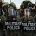 DC National Guard Military Police officers and law enforcement officers stand guard during a protests against the death in Minneapolis custody of George Floyd, near the White House in Washington, D.C., U.S., June 1, 2020. REUTERS/Jonathan Ernst