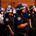 The NYPD watches as demonstrators protest against the racial inequality in the aftermath of the death in Minneapolis police custody of George Floyd, in New York City, New York, U.S. June 11, 2020. Picture taken June 11, 2020. REUTERS/Idris Solomon
