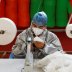 A man wears a protective face mask as he works at a mask factory, during the coronavirus disease (COVID-19) outbreak in Kabul, Afghanistan July 2, 2020. REUTERS/Mohammad Ismail